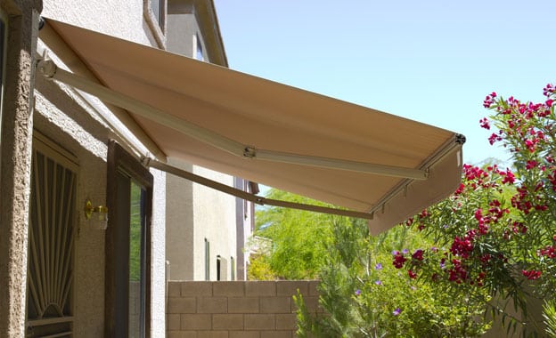 Awning Above Backyard Door Modern Architecture Awning — Premium Window Coverings In Chevallum, QLD