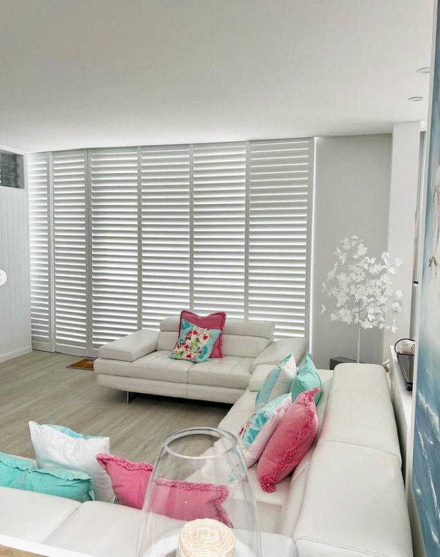 Plantation Shutters in Living Room — Premium Window Coverings In Chevallum, QLD