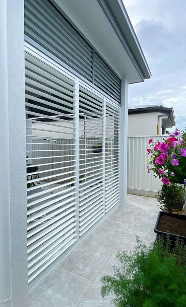 Backyard External Shutters With Flower — Premium Window Coverings In Chevallum, QLD