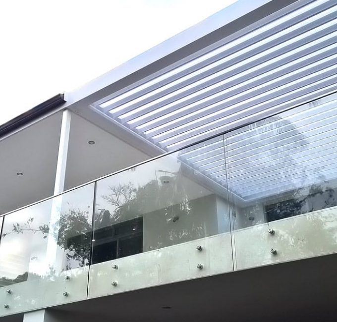Patio with glass fence — Premium Window Coverings In Mooloolaba, QLD